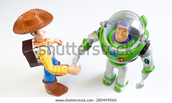 Kuala Lumpur, Malaysia - May 22, 2015: Sheriff Woody and Buzz Lightyear robot toy character from Toy Story. Toy Story is a computer-animated buddy-comedy adventure film by Pixar and Walt Disney