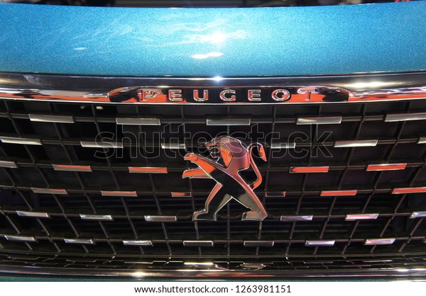 KUALA LUMPUR, MALAYSIA -NOVEMBER 11, 2017: Selected\
focused of Peugeot car emblem and brand logo at car body. Modern\
& high technology car build by France famous car manufacturer.\
  