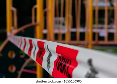 Kuala Lumpur / Malaysia - November 16th, 2020: DBKL city hall red tape restricting children from a playground in Kuala Lumpur, Malaysia during the coronavirus lockdown 