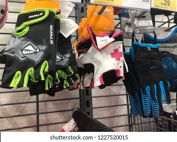 Kuala Lumpur, Malaysia - November 2018 : Decathlon Sporting Goods And Outdoors Store In Damansara Utama. Gloves Of Sale In Decathlon Market. Damansara, Malaysia.