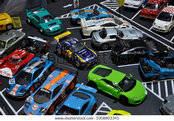 KUALA\
LUMPUR, MALAYSIA -NOVEMBER 26, 2017: Collections of various\
miniature car model at same scale. Some of them obselete from\
market and the models become collectors\'\
demands.
