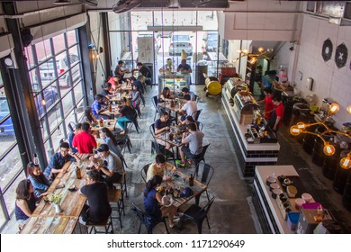 Kuala Lumpur, Malaysia Oct 02 2016 - Modern Cafe With Cozy Industrial Concept Is A Trend For The Youngster, A Coffee Culture To Hang Around With Friends, High Angle View Of A Busy Restaurant