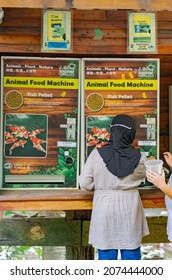 Kuala Lumpur, Malaysia - Oct 14, 2021 : Animal Food Vending Machine Selling Fish Pellet.