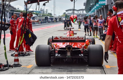 KUALA LUMPUR, MALAYSIA - OCTOBER 1, 2017 : Sebastian Vettel (Germany) Making A Pitstop In The Scuderia Ferrari SF71H F1 2018 Car During The F1 At Sepang Circuit.