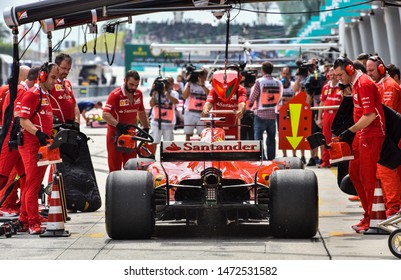 KUALA LUMPUR, MALAYSIA - OCTOBER 1, 2017 : Sebastian Vettel (Germany) Making A Pitstop In The Scuderia Ferrari SF71H F1 2018 Car During The F1 At Sepang Circuit.