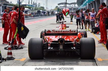 KUALA LUMPUR, MALAYSIA - OCTOBER 1, 2017 : Sebastian Vettel (Germany) Making A Pitstop In The Scuderia Ferrari SF71H F1 2018 Car During The F1 At Sepang Circuit.