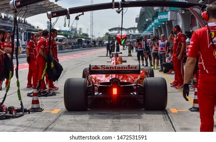 KUALA LUMPUR, MALAYSIA - OCTOBER 1, 2017 : Sebastian Vettel (Germany) Making A Pitstop In The Scuderia Ferrari SF71H F1 2018 Car During The F1 At Sepang Circuit.