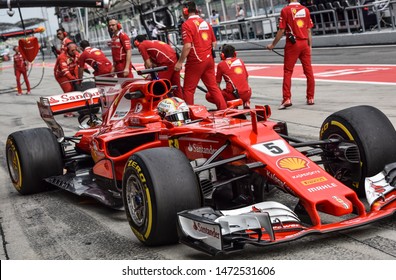 KUALA LUMPUR, MALAYSIA - OCTOBER 1, 2017 : Sebastian Vettel (Germany) Making A Pitstop In The Scuderia Ferrari SF71H F1 2018 Car During The F1 At Sepang Circuit.