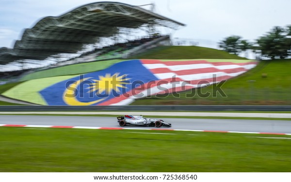 KUALA LUMPUR, MALAYSIA - OCTOBER 1,\
2017 : lance Stroll of Williams Martini Racing Team on track during\
Malaysia Formula One Grand Prix at Sepang Circuit\

