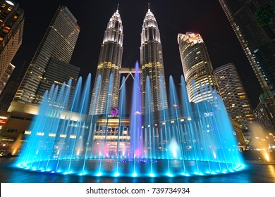 Kuala Lumpur, Malaysia : October 17, 2017 - Beautiful colorful musical fountain at KLCC Park with background of Petronas Twin Tower and Suria KLCC. This is most visiting places in Malaysia