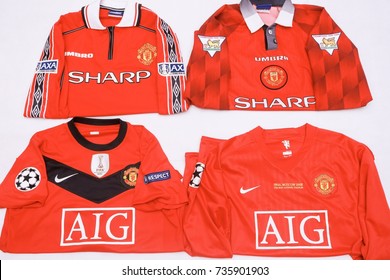 Kuala Lumpur, Malaysia - October 17th, 2017 :Manchester United Jersey Shirt Different Season Sponsored By AIG And Sharp, Designed By Umbro And Nike With Patches Of UCL,  EPL Championship Treble Winner