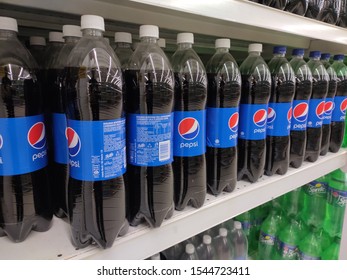 KUALA LUMPUR, MALAYSIA -OCTOBER , 2018: Pepsi drinks in large bottles are displayed on a shelf for sale in a large supermarket. Placed in large quantities based on high demand.