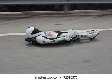 KUALA LUMPUR, MALAYSIA â?? OCTOBER 25, 2015 : Two Time Street Luge World Champion, Abdil Mahdzan From Malaysia, On A Practice Run. 