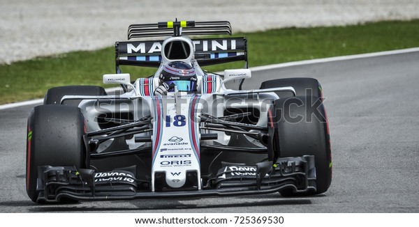 KUALA LUMPUR, MALAYSIA - OKTOBER 1,\
2017 : Lance Stroll of William Martini Racing Team on track during\
Malaysia Formula One Grand Prix at Sepang Circuit\
