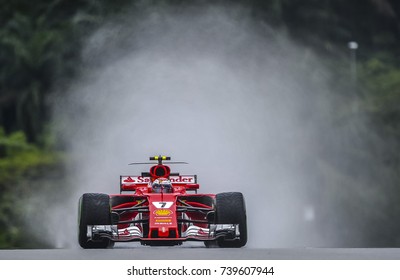 KUALA LUMPUR, MALAYSIA - SEPTEMBER 29, 2017 : Kimi Raikkonen of Finland driving the (7) Scuderia Ferrari SF70H on track during practice for the Malaysia Formula One Grand Prix at Sepang Circuit.