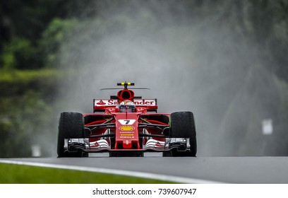 KUALA LUMPUR, MALAYSIA - SEPTEMBER 29, 2017 : Kimi Raikkonen of Finland driving the (7) Scuderia Ferrari SF70H on track during practice for the Malaysia Formula One Grand Prix at Sepang Circuit.