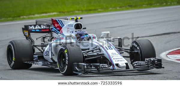 KUALA LUMPUR,\
MALAYSIA - SEPTEMBER 30, 2017 : Lance Stroll of William Martini\
Racing Team on track during qualifying for the Malaysia Formula One\
Grand Prix at Sepang Circuit\
