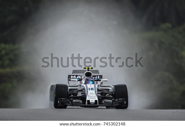KUALA LUMPUR,\
MALAYSIA - SEPTEMBER 30, 2017 : Lance Stroll of William Martini\
Racing Team on track during qualifying for the Malaysia Formula One\
Grand Prix at Sepang\
Circuit