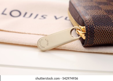 kuala lumpur, malaysia,19th Dec 2016,Louis Vuitton wallet on the white background ,Louis Vuitton is a designer fashion brand known for its leather goods