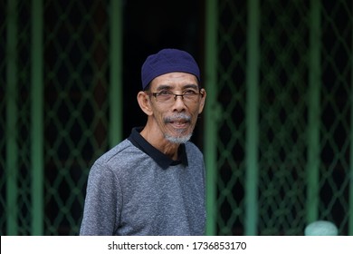 Kuala Lumpur- Mei 19 2020 : Malay old man being portrait in Kuala Lumpur Malaysia