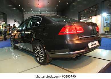 KUALA LUMPUR - NOV 12: VW Passat On Display At The Car Of The Year Auto Show On November 12, 2011 In Kuala Lumpur, Malaysia. The New Passat Is A 7-speed Direct Shift Gearbox DSG With Turbocharged TSI Engine.