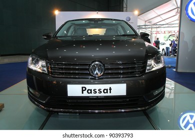 KUALA LUMPUR - NOV 12: VW Passat On Display At The Car Of The Year Auto Show On November 12, 2011 In Kuala Lumpur, Malaysia. The New Passat Is A 7-speed Direct Shift Gearbox DSG With Turbocharged TSI Engine.