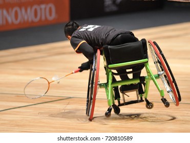 KUALA LUMPUR, SEPTEMBER 22, 2017: Paralympic athletes compete in the defending badminton tournament at the 9th Asean Para Games at the National Sports Complex in Bukit Jalil, Kuala Lumpur, Malaysia.