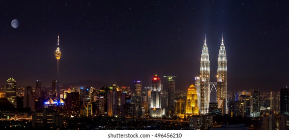 Kuala Lumpur skyline at night with moon - Shutterstock ID 496456210