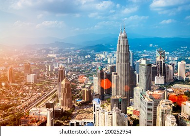 Kuala Lumpur skyline with the Petronas Towers and other skyscrapers. (Malaysia.)