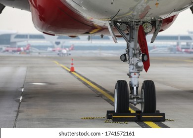 Kuala Lumpur,27 May 2020-Malaysia.
A Close Up Shot Of An Aeroplane Landing Gear In Kuala Lumpur International Airport.