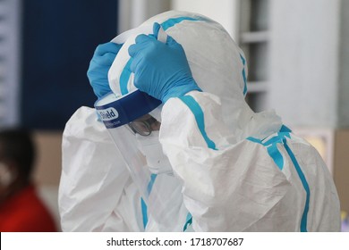 Kuala Lumpur,28 April 2020-Malaysia. A Malaysian Medical Workers Wearing Personal Protective Equipment Before Conduct A Covid-19 Test In Kuala Lumpur.