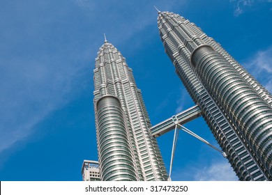 KUALA LUMPUR,MALAYSIA - JULY 11, 2009: The Petronas Towers,Petronas Twin Towers Are Twin Skyscrapers In Kuala Lumpur, Malaysia. Malaysia.Malaysia Is A Member Of Asean Economic Community (AEC)