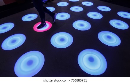 Kuala Lumpur-MALAYSIA- Nov 17, 2017: A Visitor Step On A Blue Led Turn Red Art Installation During Arts And Lights At Icon City In Kuala Lumpur, Malaysia.