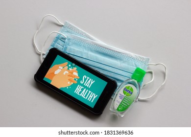 Kuala Lumpur,Malaysia - October 12 2020 : Smart Phone Showing Stay Healthy Logo. Covid-19 Coronavirus Stay Home Concept