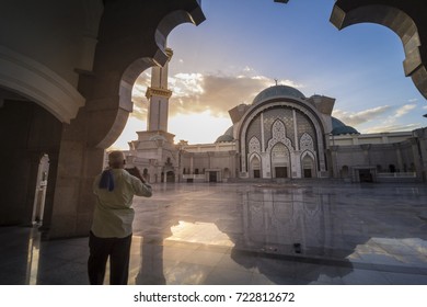 KUALA LUMPUR,MALAYSIA-23 SEPTEMBER 2017: Old Malay Man Stood Before Majestic Mosque For Photo Shoot