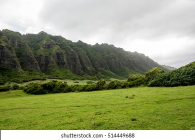 Kualoa Ranch in Oahu, Hawaii.  Many famous television shows and movies, including "Jurassic Park" and "Lost" were filmed in Kualoa Ranch.