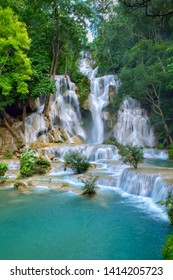 Kuang si waterfall is the biggest & most gorgeous falls in Luang Prabang. The purity water & the glamour of nature make this waterfall well-known & attract people from all around the world to visit. - Shutterstock ID 1414205723