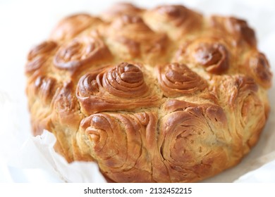 Kubaneh Bread - A Traditional Yemenite Jewish Brioche Bread -baked Overnight For Saturday Breakfast Or Brunch. Copy Space White Background