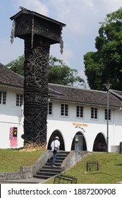 Kuching, Malaysia - August 2015 : An Asian Man Walking In Front Of Sarawak Art Museum.