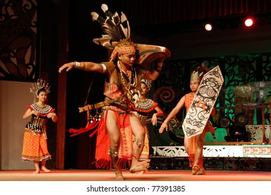 KUCHING, MALAYSIA - MAY 14: Warrior From The Indigenous Iban People Performs A Traditional Dance At The Sarawak Cultural Village, May14, 2010 In Kuching. The Ibans Were Known To Be Head-hunters In The Past.