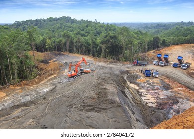 KUCHING, MALAYSIA - MAY 16 2015: Deforestation. Photo Of Tropical Rain Forest In Borneo Being Destroyed To Make Way For Oil Palm Plantation.