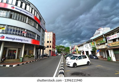 Kuching, Sarawak - May 4, 2019 : Kuching Town Street And Old Shop Houses With Black Thick Cloud At The Background