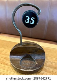 Kuching Sarawak | The Table Number Sign Number 35 In A Restaurant Made From Wood And Iron.