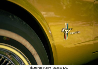 Kuchyna, Slovakia - May 29, 2021: Public Exhibition Of Classic Cars.  Detail Of Mustang Logo. Ford Mustang 1965.