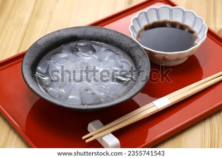 Kudzu Kiri (Japanese arrowroot starch noodles with brown sugar syrup) is a Japanese popular summer dessert.