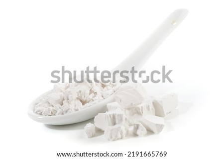 Kudzu or Kuzu Starch on a Spoon isolated on white Background