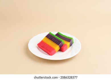 Kue Lapis or Kue Pepe or Rainbow sticky layer cake, Indonesian traditional dessert made from rice flour and coconut milk, steamed layer by layer. Selective focus. - Shutterstock ID 2086328377