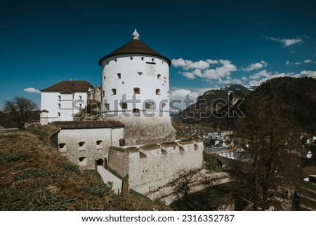 Kufstein fortress in Austria with Alps