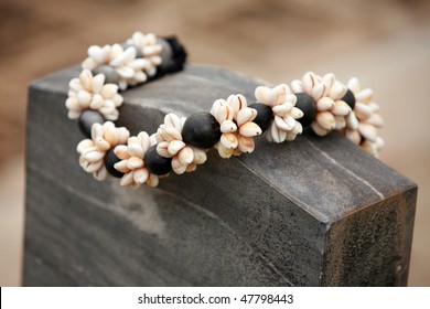 Kukui Nut Shell Lei On A Grave Stone