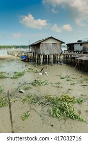 Kukup Fishing Village Pontian District, Johor, Malaysia. Kukup Are Famous With Open-air Seafood Restaurants Built On Stilts Over The Water.
